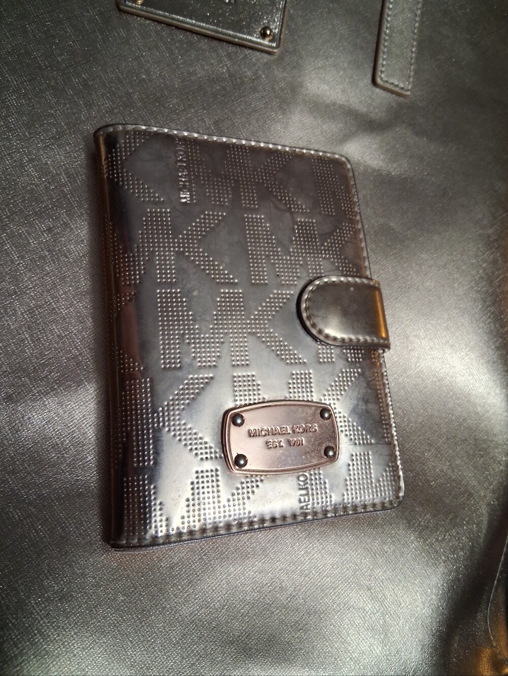 Michael Kors Rose Gold Embossed MK Monogram Wallet